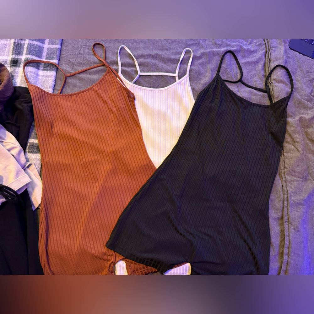 3 body suits with an open back